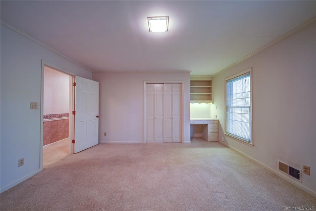 1415 Melchor Road Albemarle, NC 28001 - Photo 17 of 47 a view of an empty room with a window
