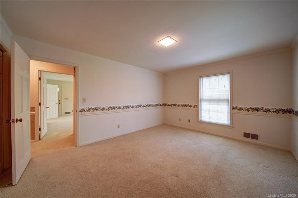 1415 Melchor Road Albemarle, NC 28001 - Photo 20 of 47 a view of an empty room with a window