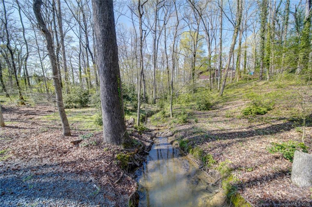 1415 Melchor Road Albemarle, NC 28001 - Photo 3 of 47 a view of a park with large trees