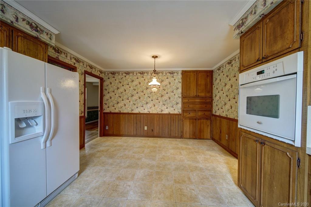 1415 Melchor Road Albemarle, NC 28001 - Photo 28 of 47 a view of a kitchen with a sink and refrigerator