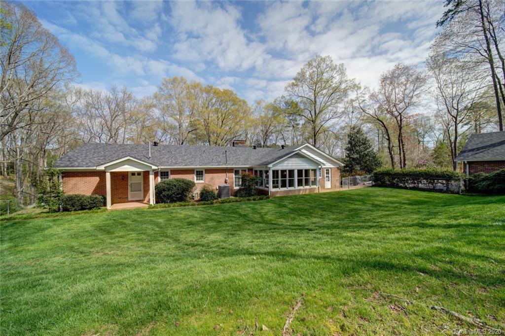1415 Melchor Road Albemarle, NC 28001 - Photo 5 of 47 a front view of a house with a garden