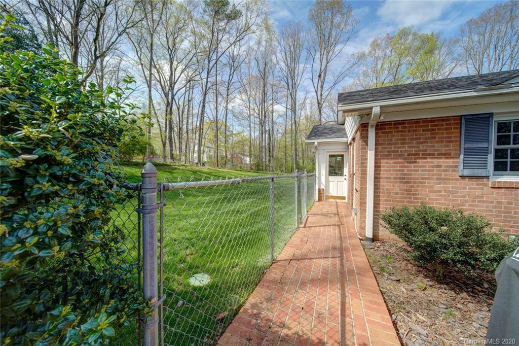 1415 Melchor Road Albemarle, NC 28001 - Photo 7 of 47 a view of a pathway with a house in the background