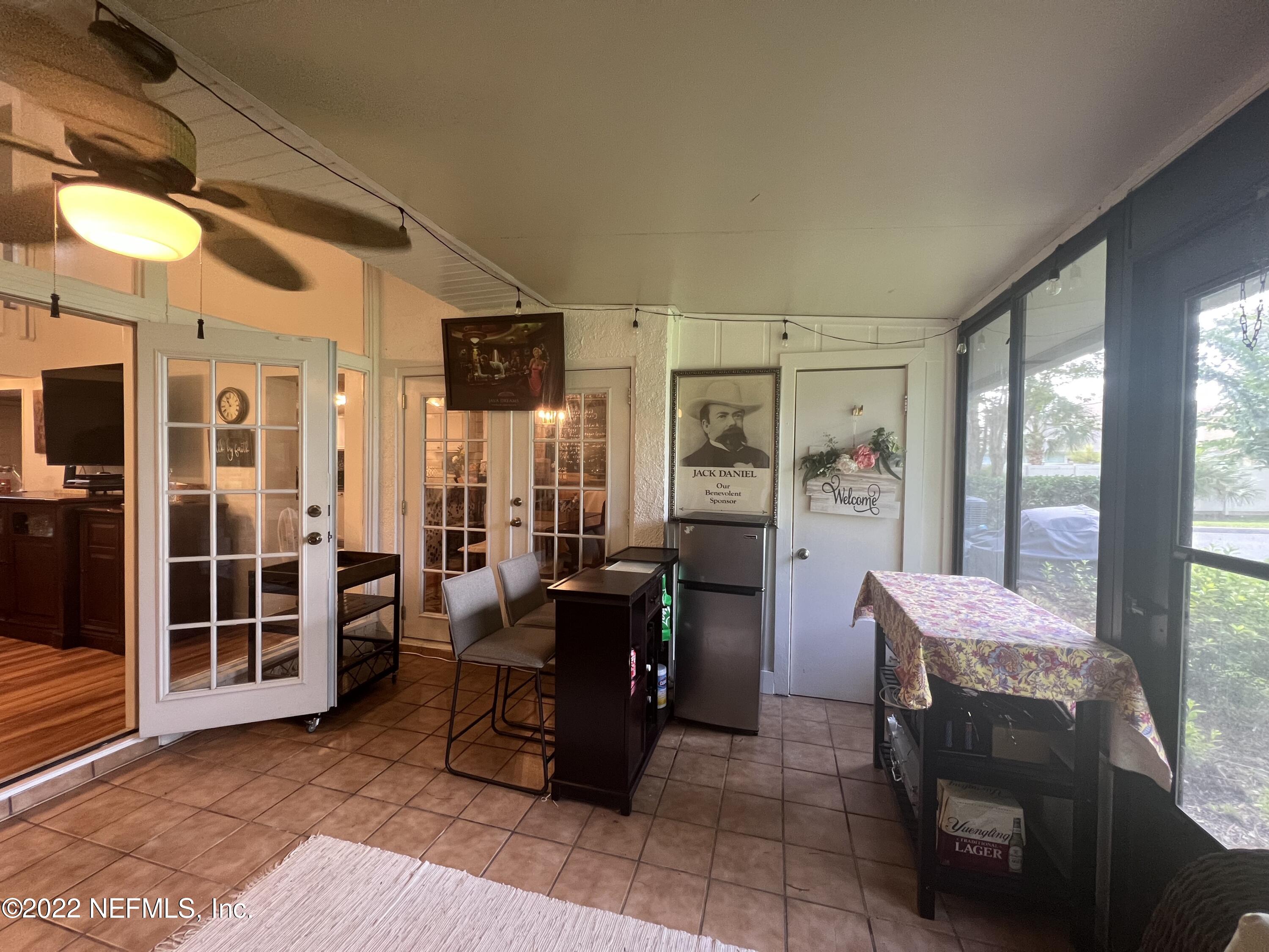 7122 Cypress Cove Road, Unit 47 Jacksonville, FL 32244 - Photo 5 of 24 a view of a livingroom with furniture and windows