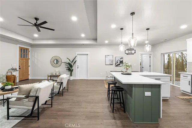 a kitchen with a table and chairs