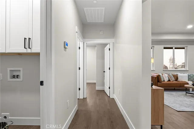 a view of a livingroom with furniture and windows