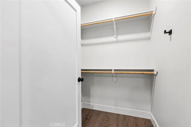 a view of an empty walk in closet