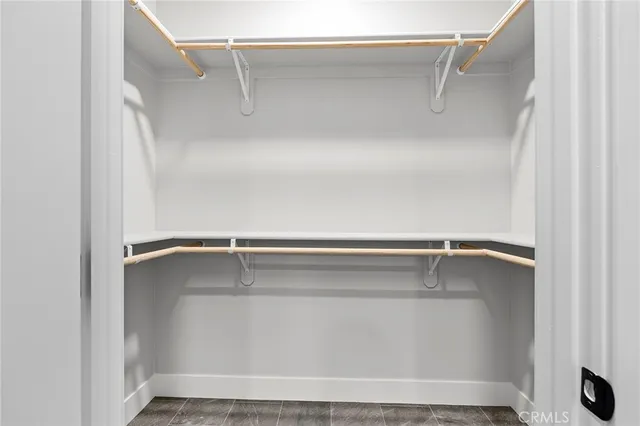 a view of an empty walk in closet