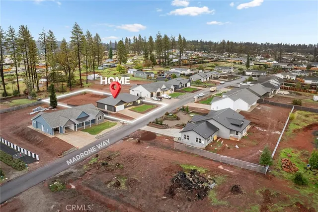 a front view of a house with yard