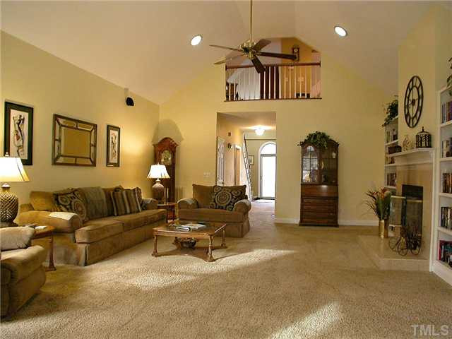 6812 Cool Pond Road Raleigh, NC 27613 - Photo 5 of 25 Great Room has Cathedral Ceiling, and View of 2nd Floor Bonus Room and Loft Space Den/Family/Great Room