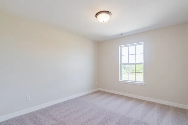 an empty room with a window