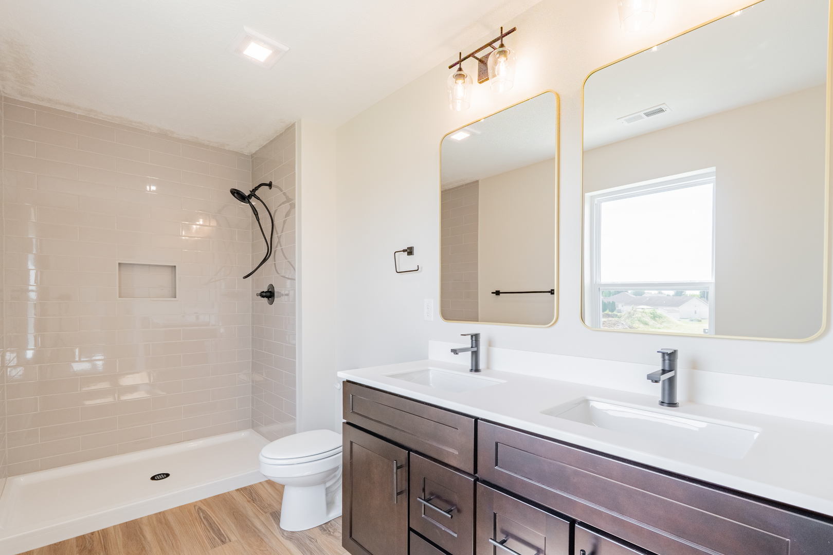 503 Wild Turkey Lane Normal, IL 61761 - Photo 25 of 34 a bathroom with a sink a toilet and shower