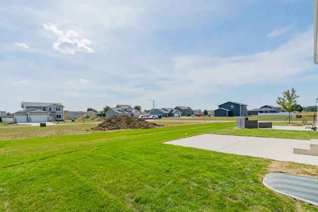 a view of a house with a big yard