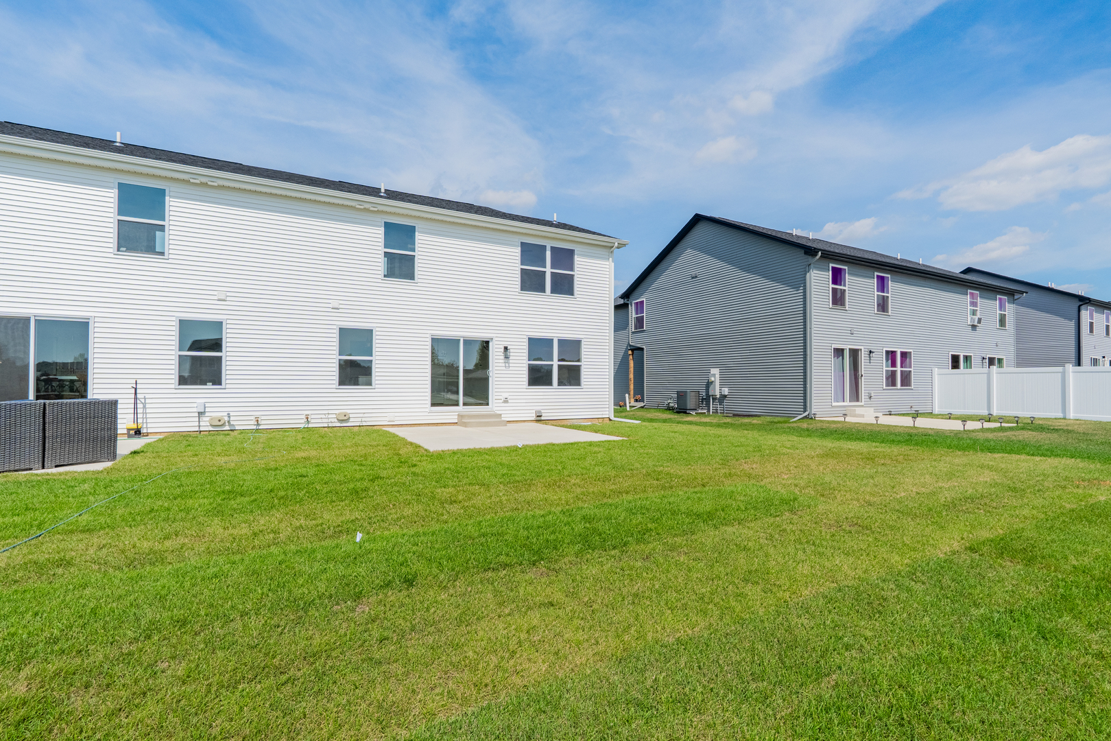 503 Wild Turkey Lane Normal, IL 61761 - Photo 34 of 34 a backyard of a house with table and chairs