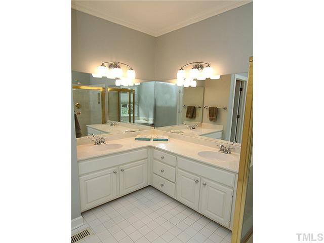 5101 Talton Circle Raleigh, NC 27612 - Photo 15 of 25 Master bath with updated faucets and lights has dual lavatories. Master Bath/Spa