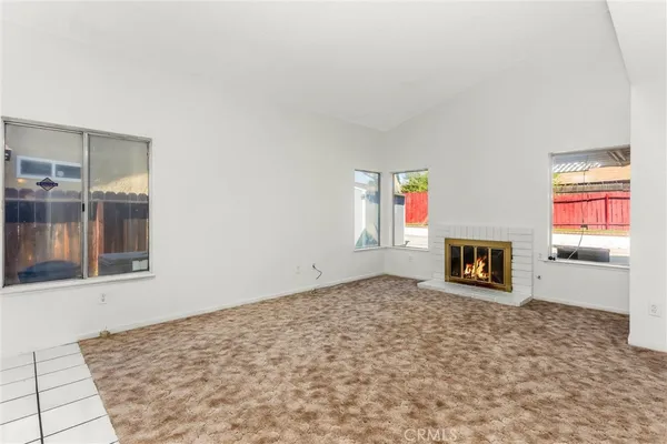 a view of a livingroom with a fireplace