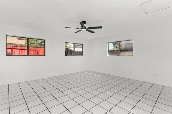 a kitchen with a sink cabinets and utility