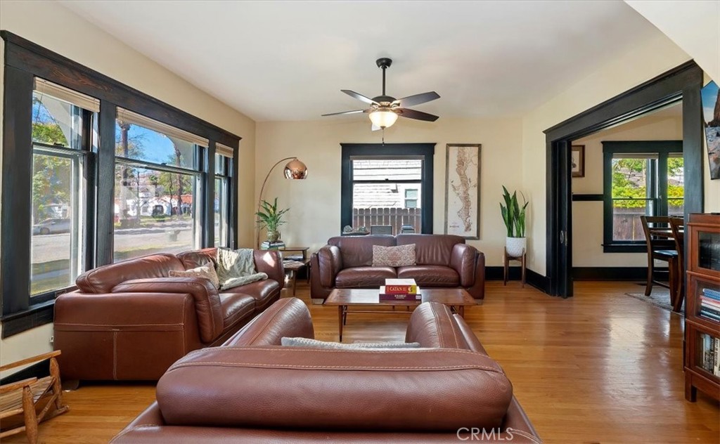 4161 University Riverside, CA 92501 - Photo 12 of 52 a living room with furniture ceiling fan and a window