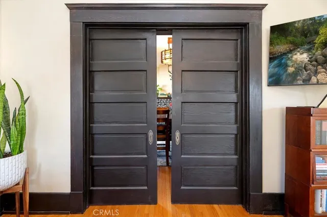 a view of walk in closet with empty room