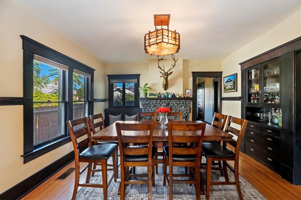 4161 University Riverside, CA 92501 - Photo 18 of 53 a dining room with furniture a garden and chandelier