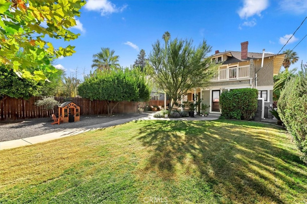 4161 University Riverside, CA 92501 - Photo 2 of 52 a front view of a house with a yard