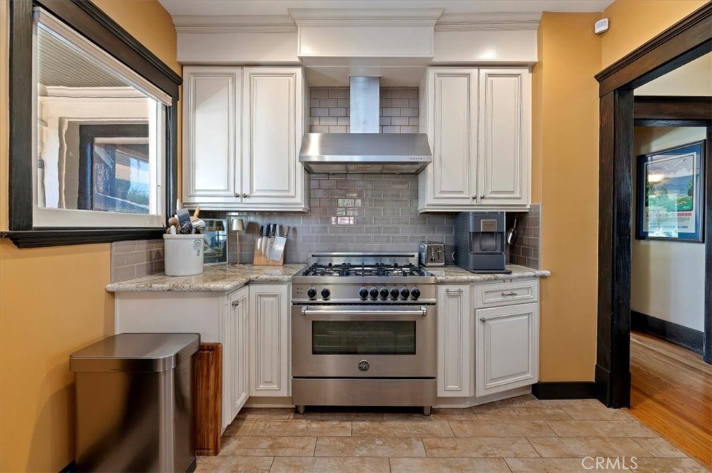 4161 University Riverside, CA 92501 - Photo 23 of 53 a kitchen with stainless steel appliances granite countertop a stove and a sink