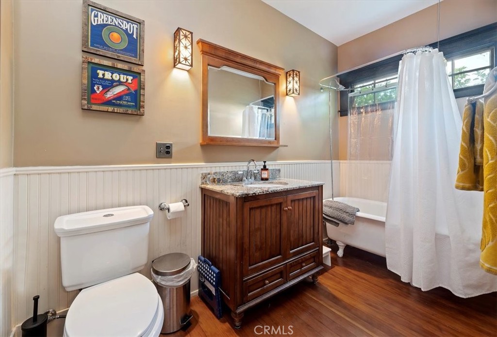 4161 University Riverside, CA 92501 - Photo 27 of 52 a bathroom with a toilet a sink and a mirror