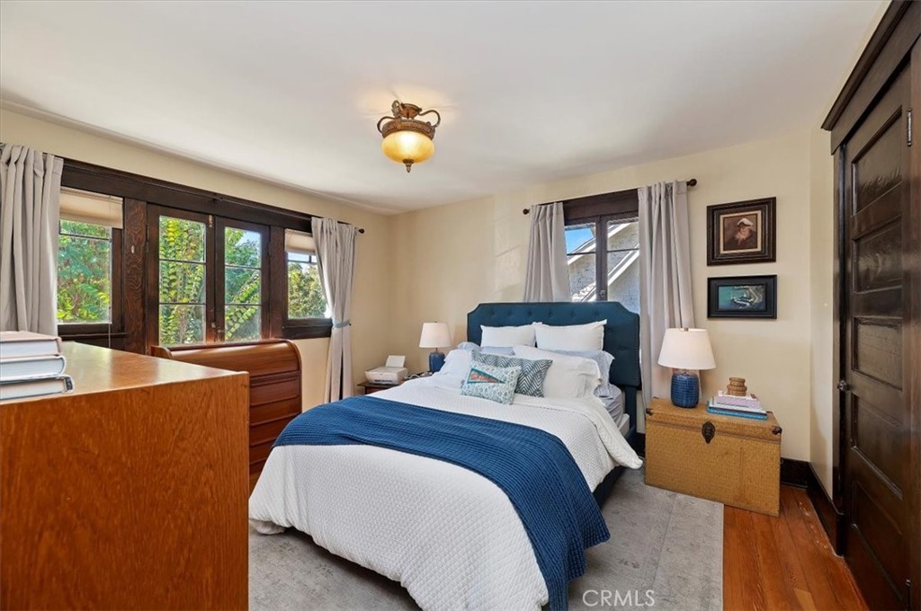 4161 University Riverside, CA 92501 - Photo 36 of 53 a bedroom with a bed a dresser next to a window