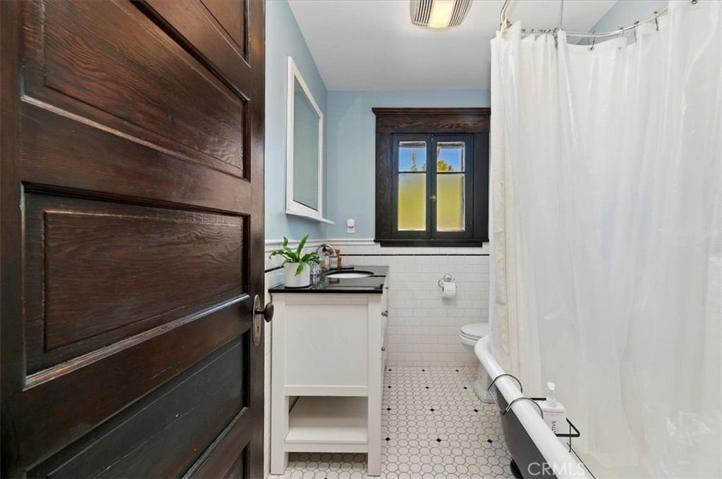4161 University Riverside, CA 92501 - Photo 40 of 53 a bathroom with a sink and a mirror