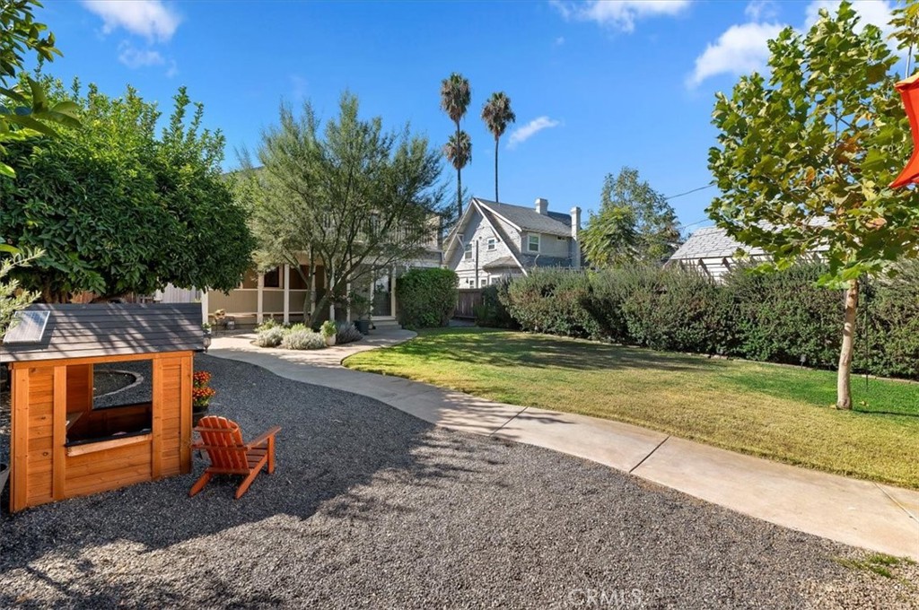 4161 University Riverside, CA 92501 - Photo 45 of 52 a view of a swimming pool with a yard and plants