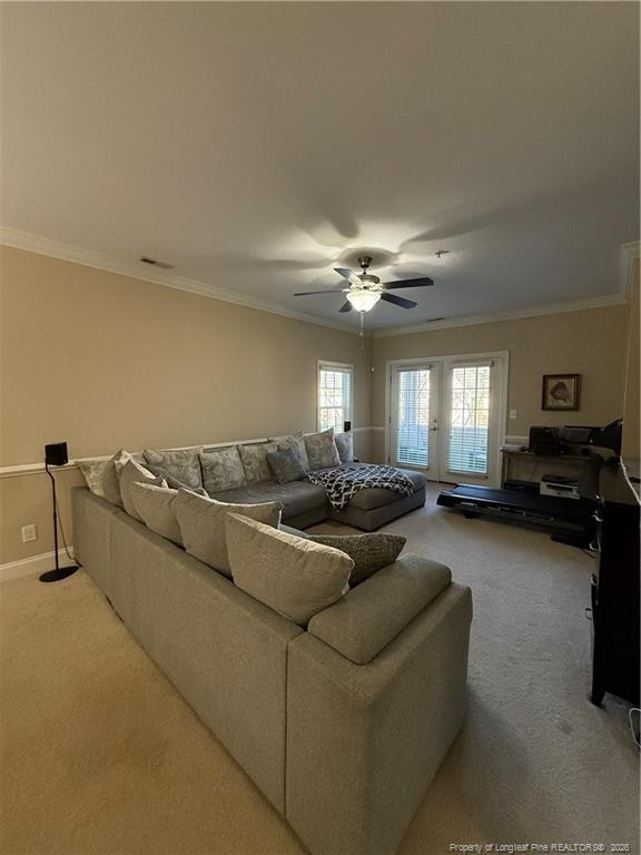 321 Gallery Drive, Unit 203 203 Spring Lake, NC 28390 - Photo 6 of 25 a living room with furniture and a chandelier