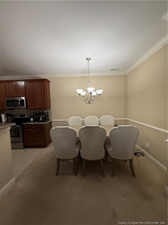321 Gallery Drive, Unit 203 203 Spring Lake, NC 28390 - Photo 7 of 25 a living room with furniture a chandelier and kitchen view