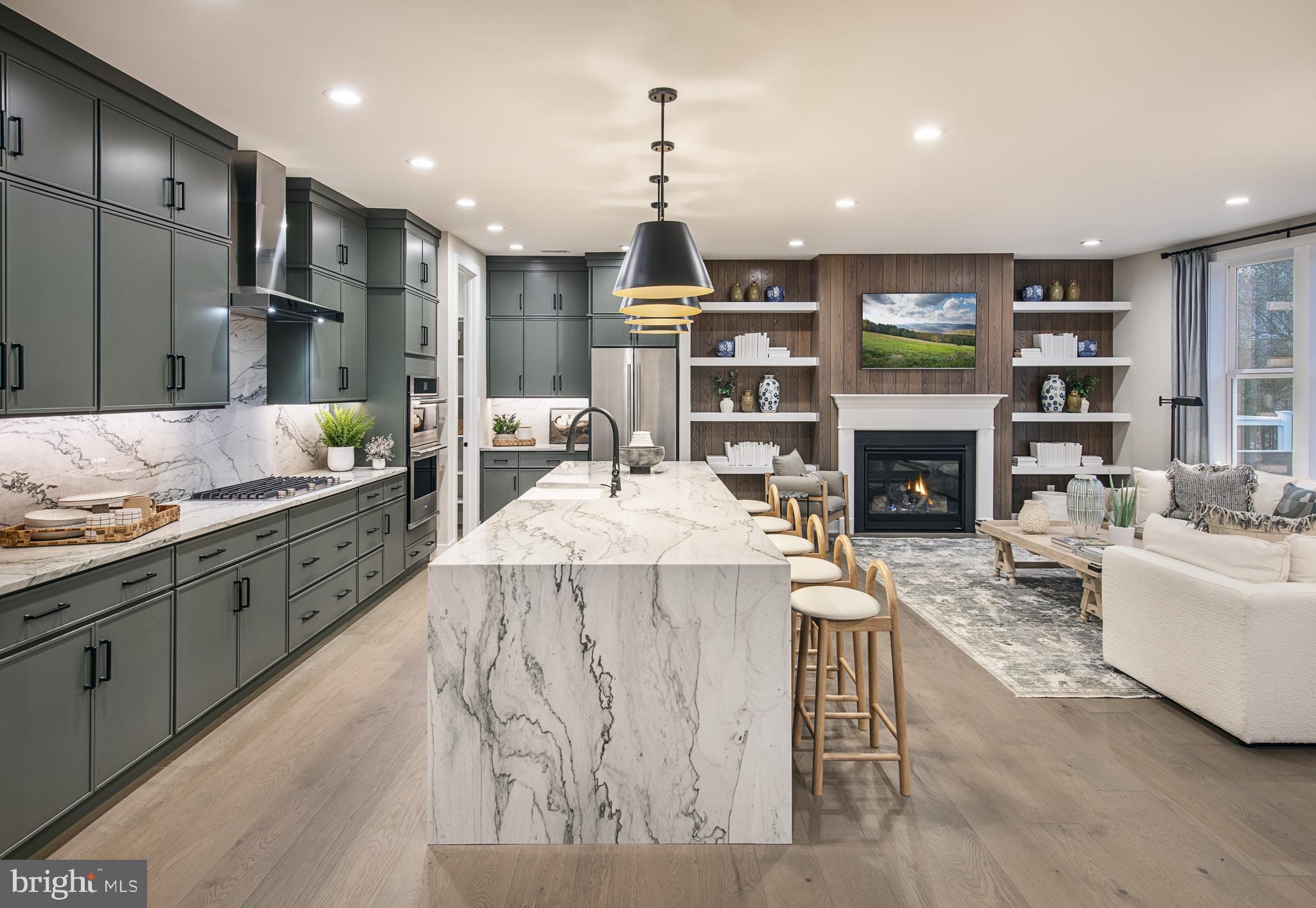 171 Alroy Road, Unit HOMESITE 62 Malvern, PA 19355 - Photo 16 of 20 a large kitchen with stainless steel appliances kitchen island granite countertop a sink and cabinets