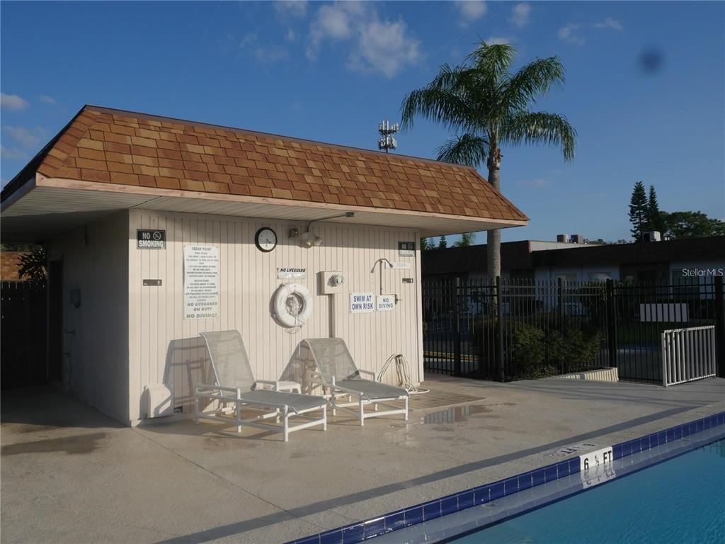 6165 Chesham Drive, Unit 5 New Port Richey, FL 34653 - Photo 35 of 35 a front view of a house with parking