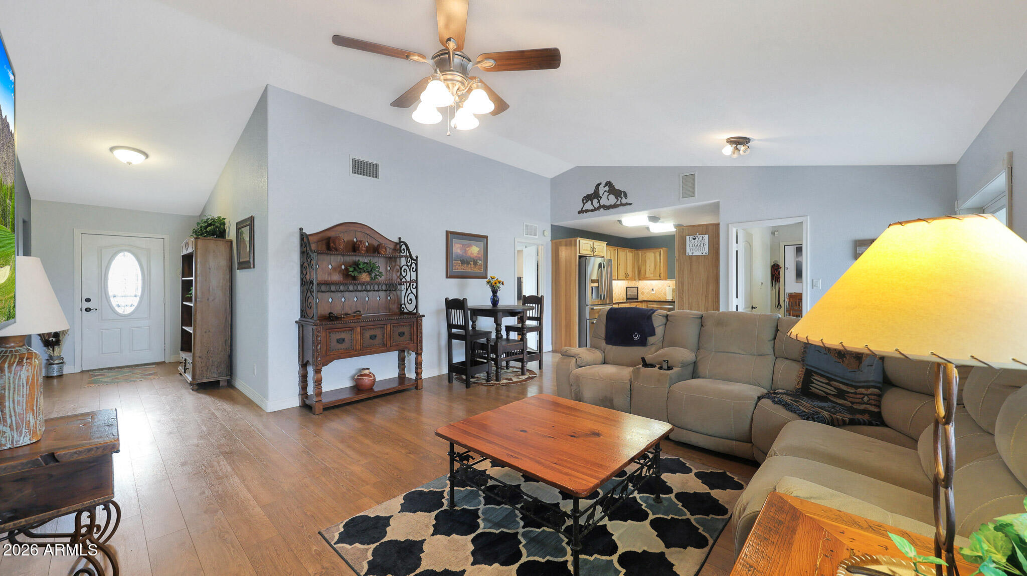 8120 West Williams Road Peoria, AZ 85383 - Photo 11 of 46 a living room with furniture and wooden floor