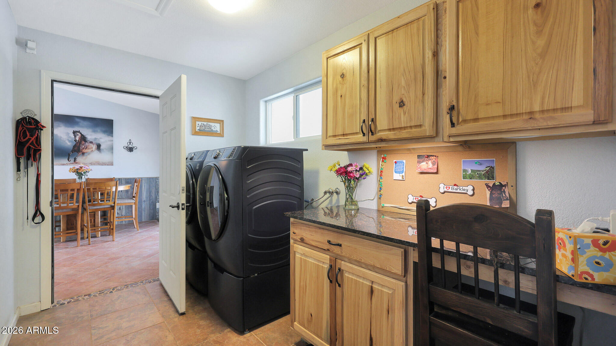 8120 West Williams Road Peoria, AZ 85383 - Photo 21 of 46 a kitchen with stainless steel appliances granite countertop a refrigerator and a stove top oven