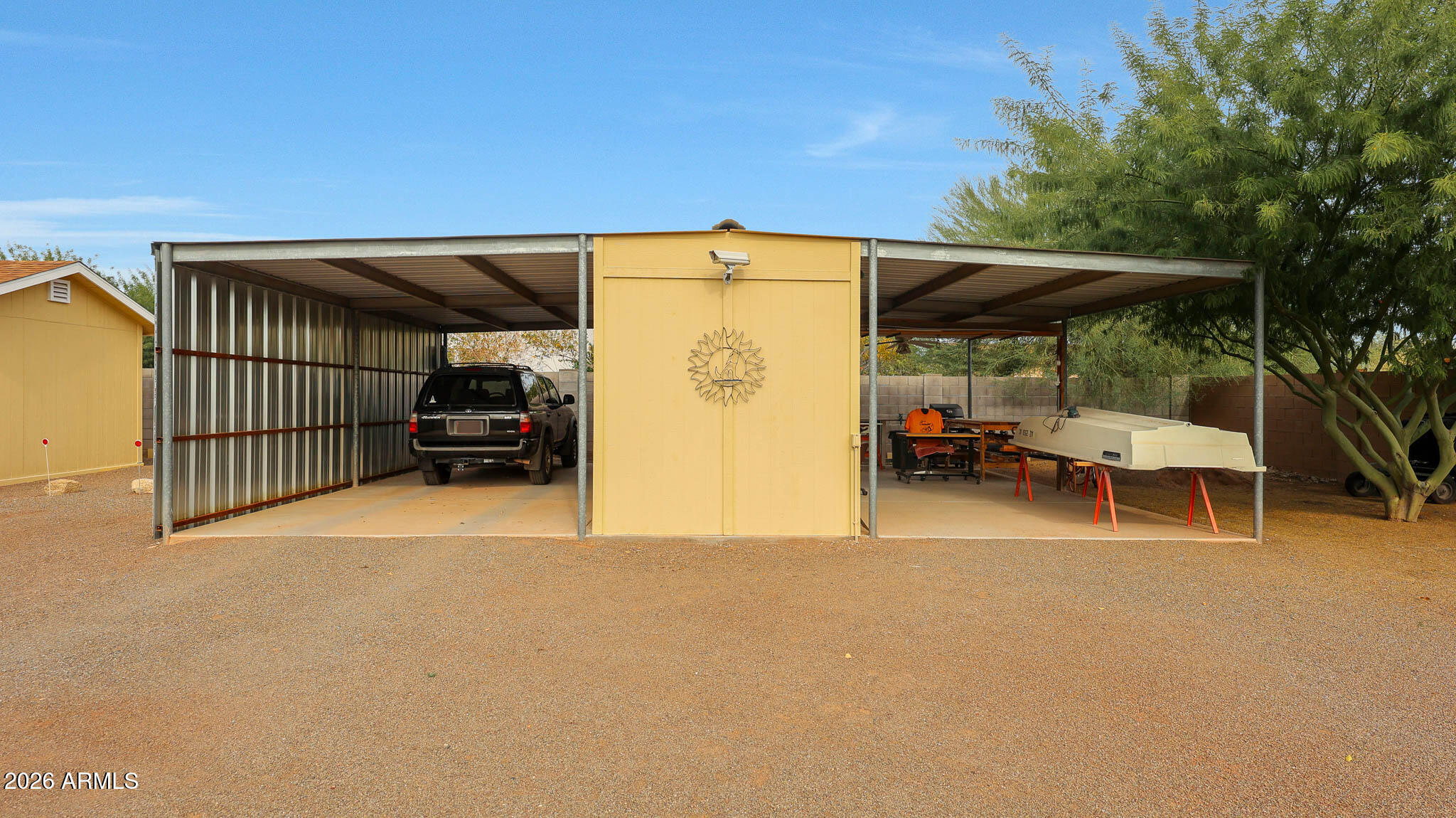 8120 West Williams Road Peoria, AZ 85383 - Photo 38 of 46 a view of patio with table and chairs and potted plants