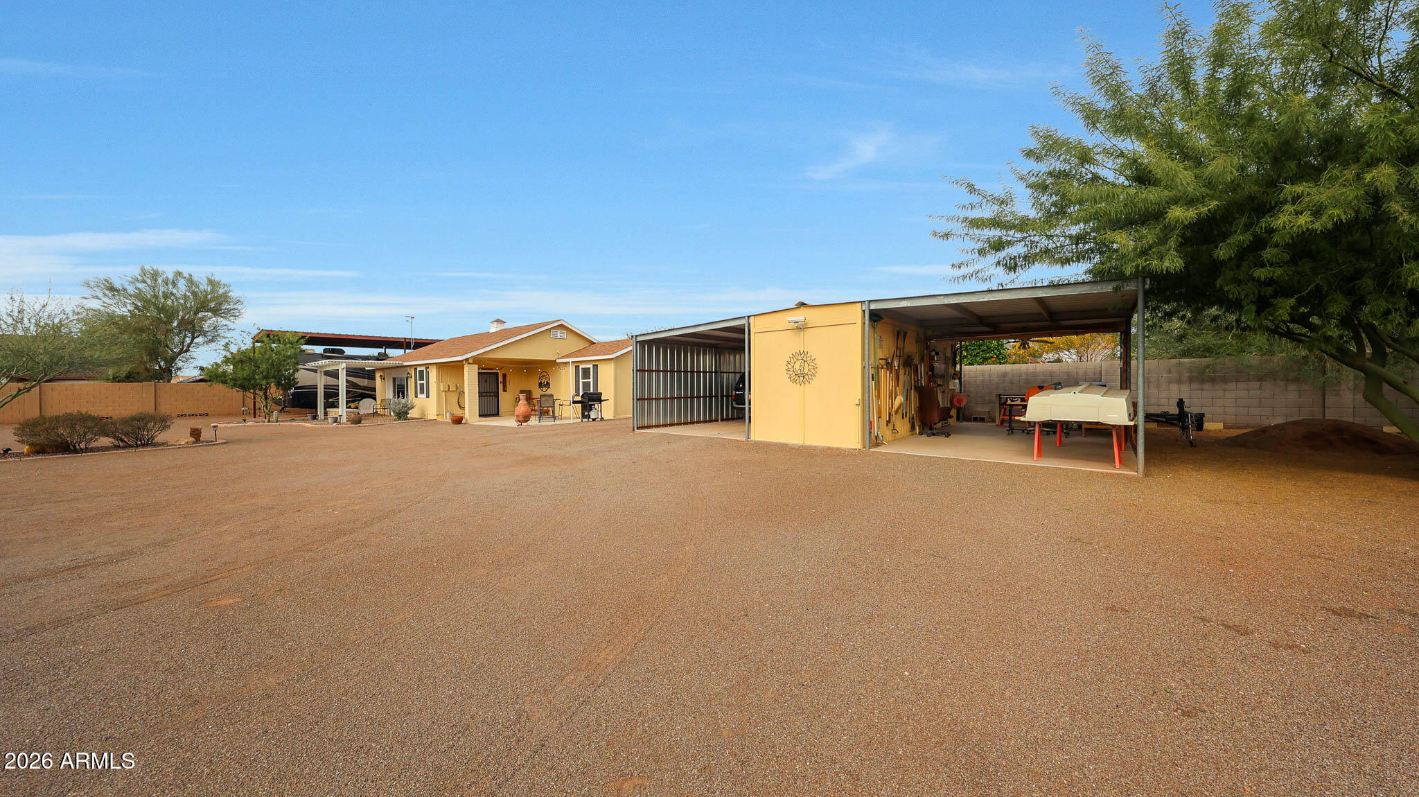 8120 West Williams Road Peoria, AZ 85383 - Photo 39 of 46 a house with a parking space