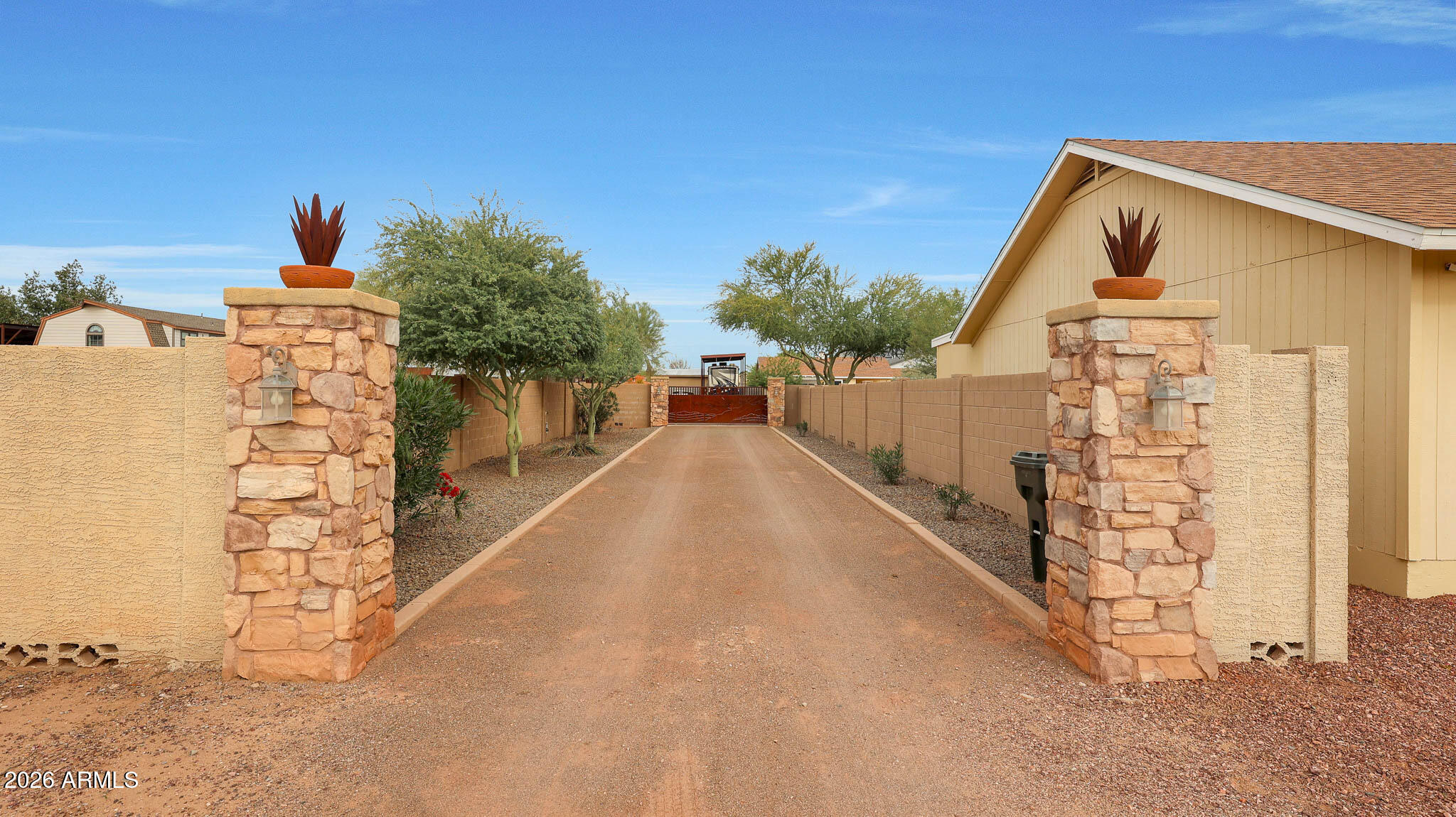 8120 West Williams Road Peoria, AZ 85383 - Photo 4 of 46 a view of a house with a yard