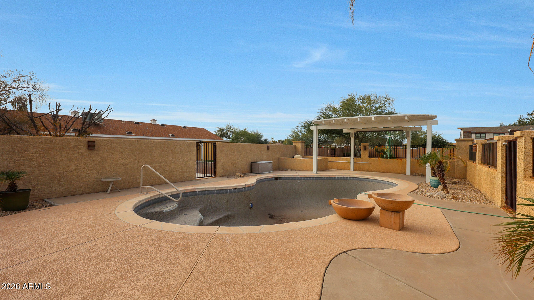 8120 West Williams Road Peoria, AZ 85383 - Photo 43 of 46 a view of a house with swimming pool and sitting area