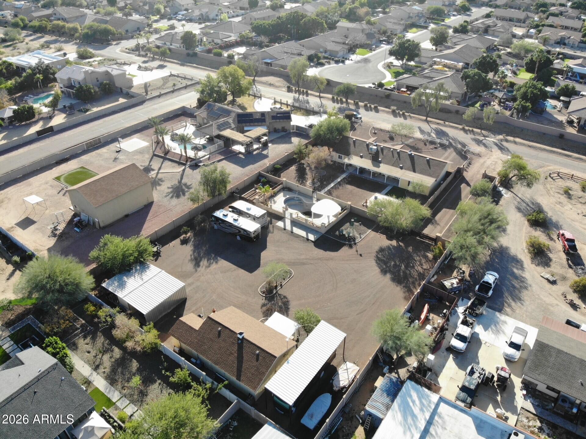 8120 West Williams Road Peoria, AZ 85383 - Photo 45 of 46 an aerial view of a residential houses with yard