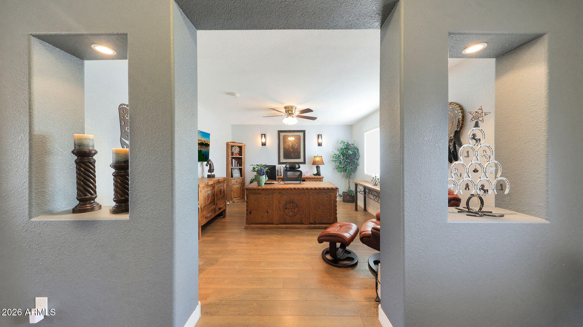 8120 West Williams Road Peoria, AZ 85383 - Photo 7 of 46 a room with furniture and a chandelier
