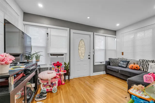 a bedroom with furniture and a gym equipment