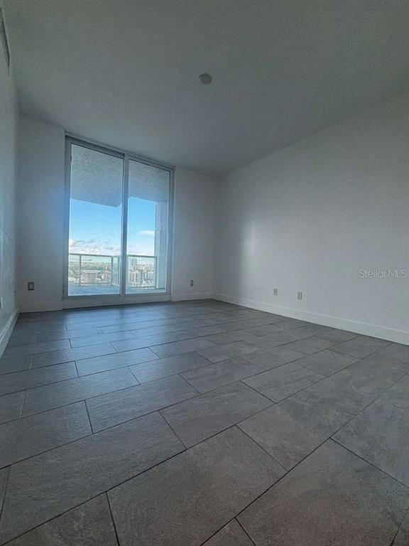 315 Northeast 3rd Avenue, Unit 2009 Fort Lauderdale, FL 33301 - Photo 6 of 11 a view of an empty room with a window