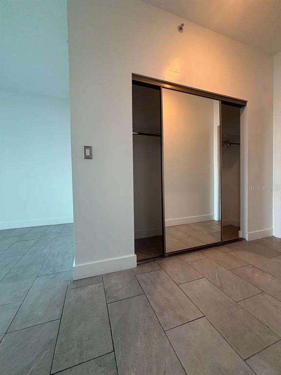 315 Northeast 3rd Avenue, Unit 2009 Fort Lauderdale, FL 33301 - Photo 7 of 11 a view of an empty room with closet