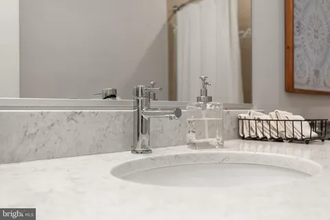a bathroom with sinks and a vanity