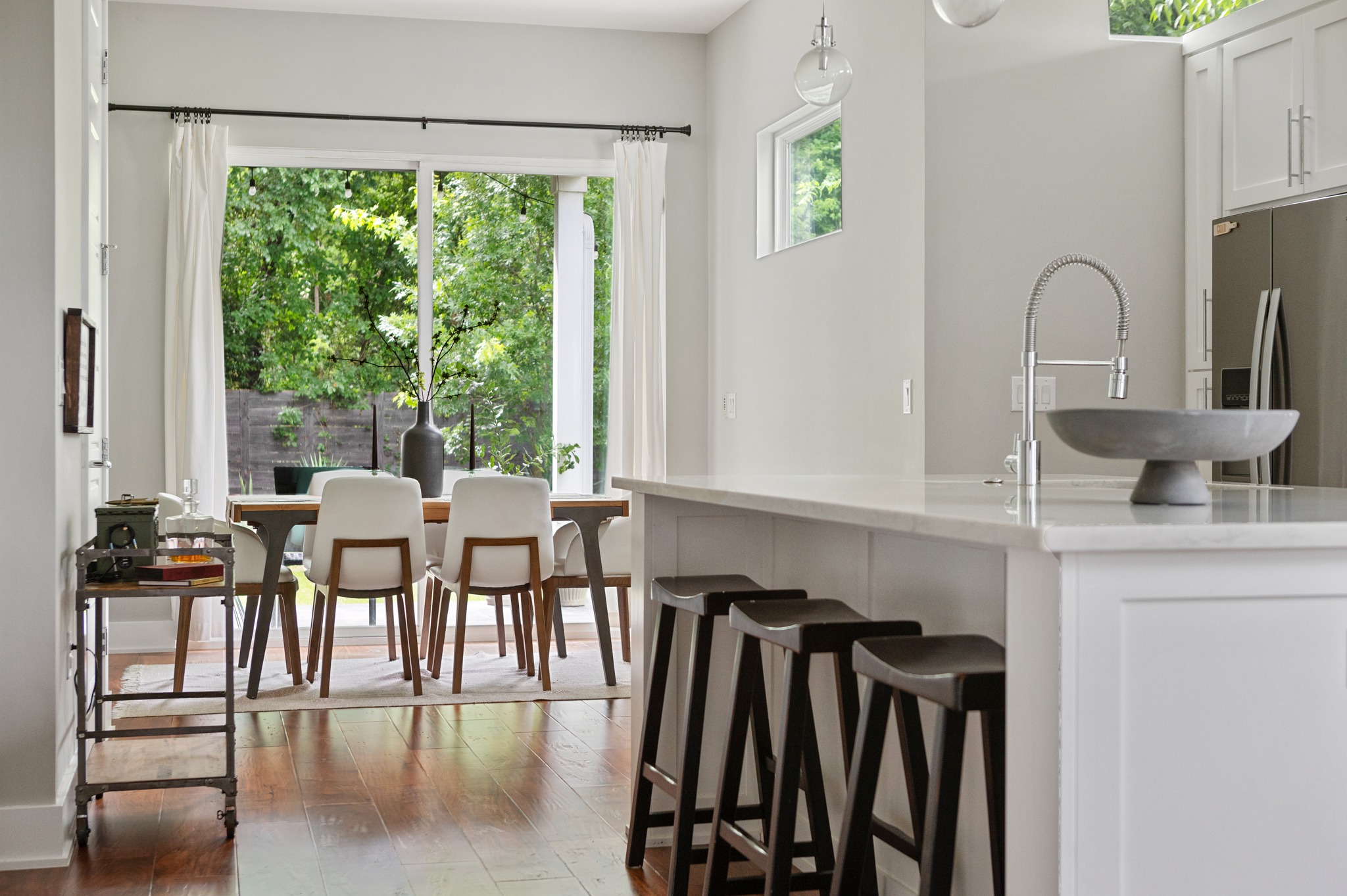 1103 Saucedo Street, Unit 1 Austin, TX 78721 - Photo 19 of 40 Bright, open-concept living with generous light-filled spaces.
