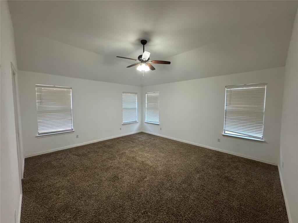 6611 Rockdale Road Fort Worth, TX 76134 - Photo 15 of 32 a view of an empty room with a window