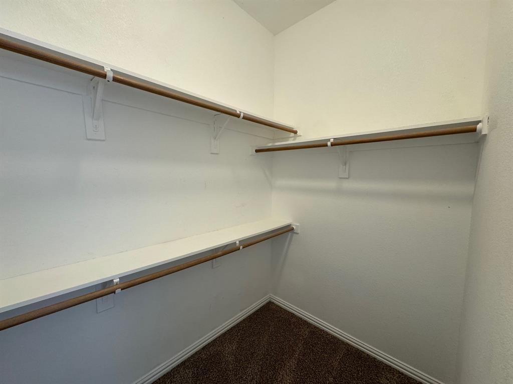 6611 Rockdale Road Fort Worth, TX 76134 - Photo 20 of 32 a close up view of racks on the wall