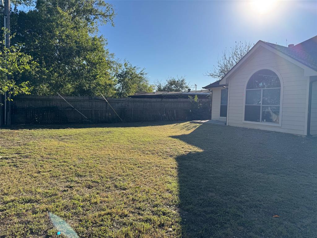 6611 Rockdale Road Fort Worth, TX 76134 - Photo 30 of 32 a view of a swimming pool with an outdoor space