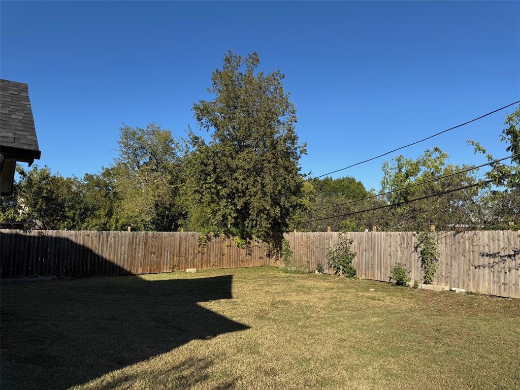 6611 Rockdale Road Fort Worth, TX 76134 - Photo 31 of 32 a view of a swimming pool with a patio